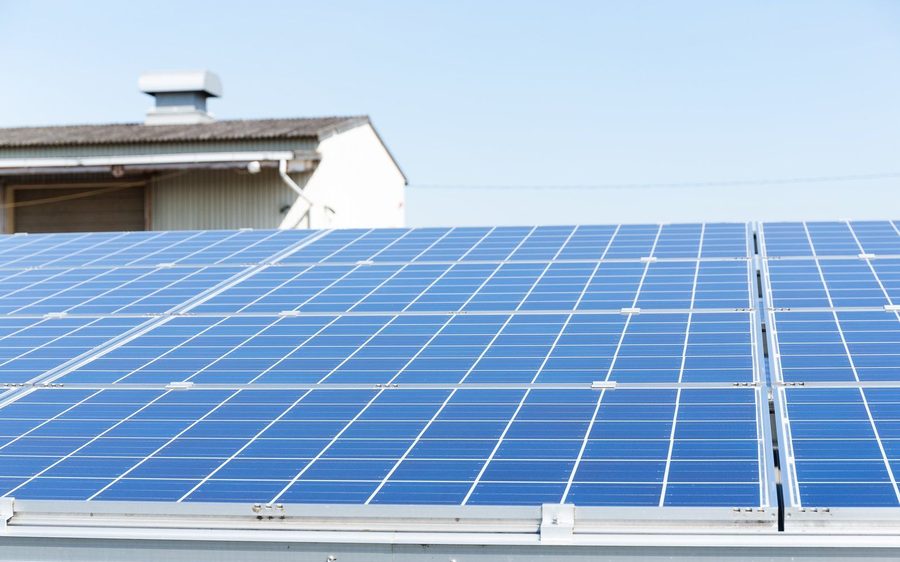 Large commercial ground-mounted solar array being cleaned on Oahu